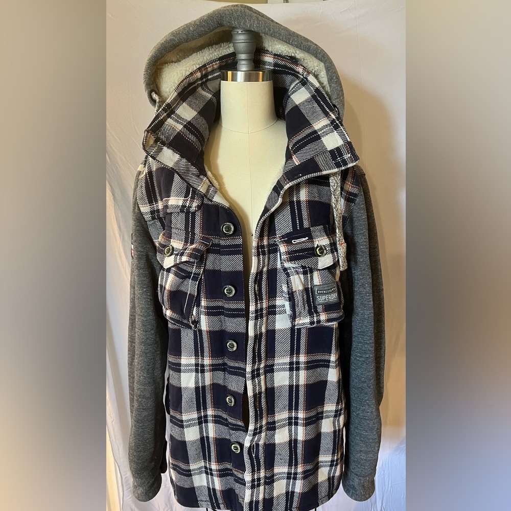 Superdry. Men’s large but fits medium. Plaid blue with gray on sleeves and hood